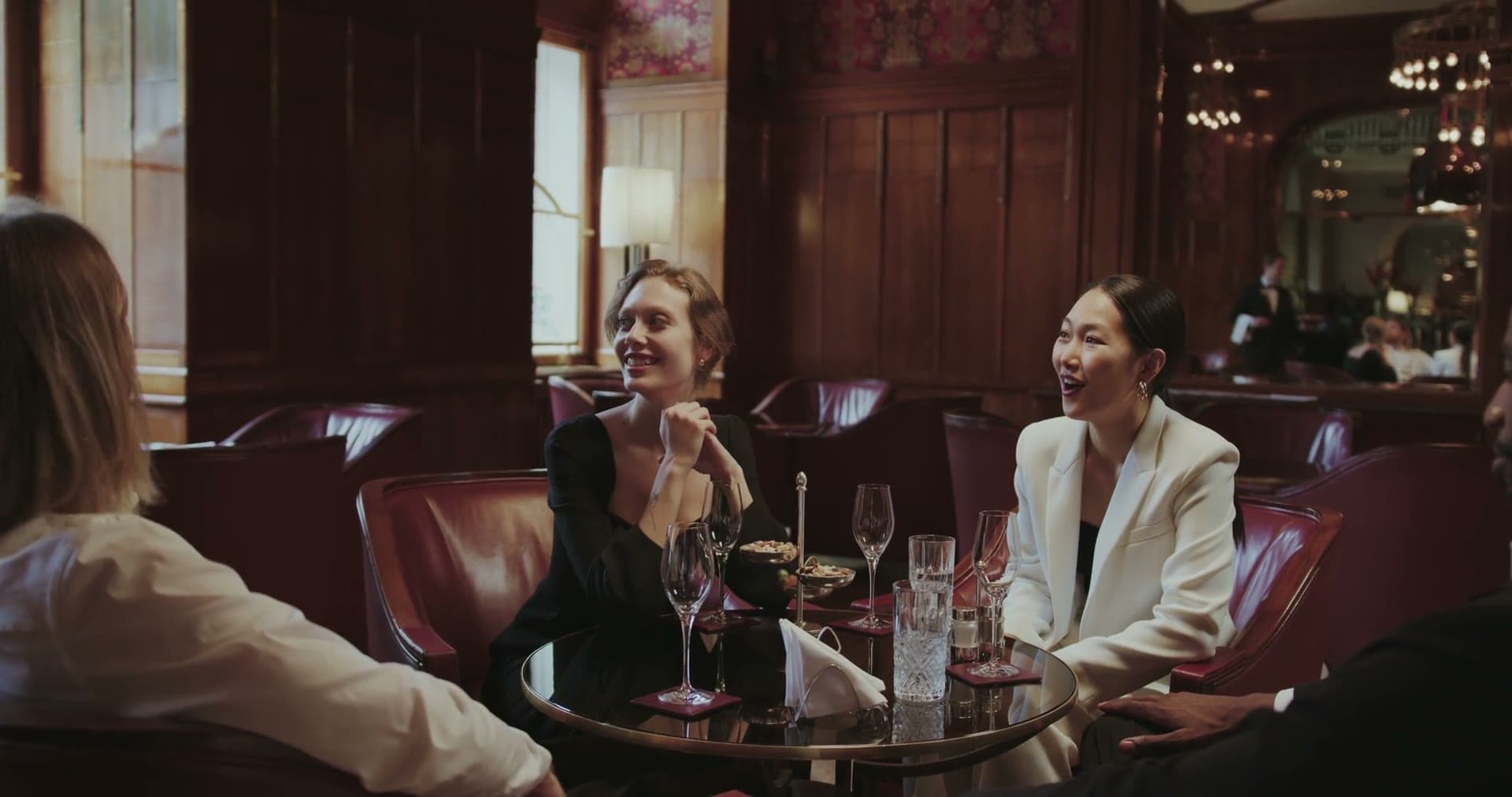 Lounge group at a wood-paneled bar
